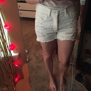 American Eagle white distressed jean shorts
